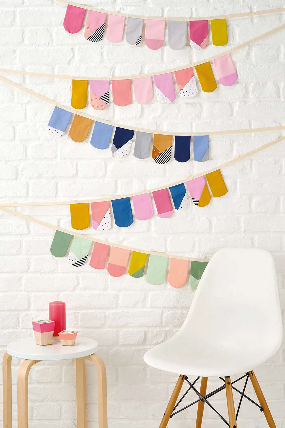 Bunting on wall with table and chair