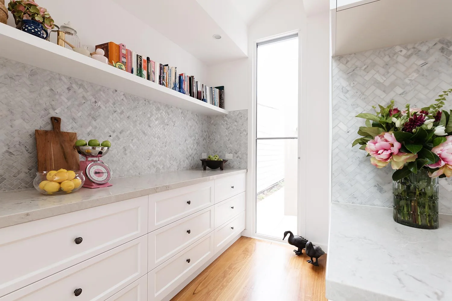 kitchen with stone bench timber floor