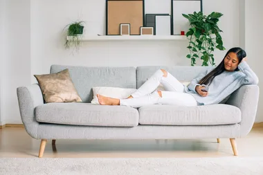 Research reveals Aussies spend 50 days on the couch each year