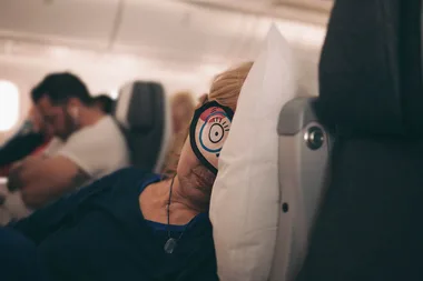 This is the best place to sit for sleeping on a plane