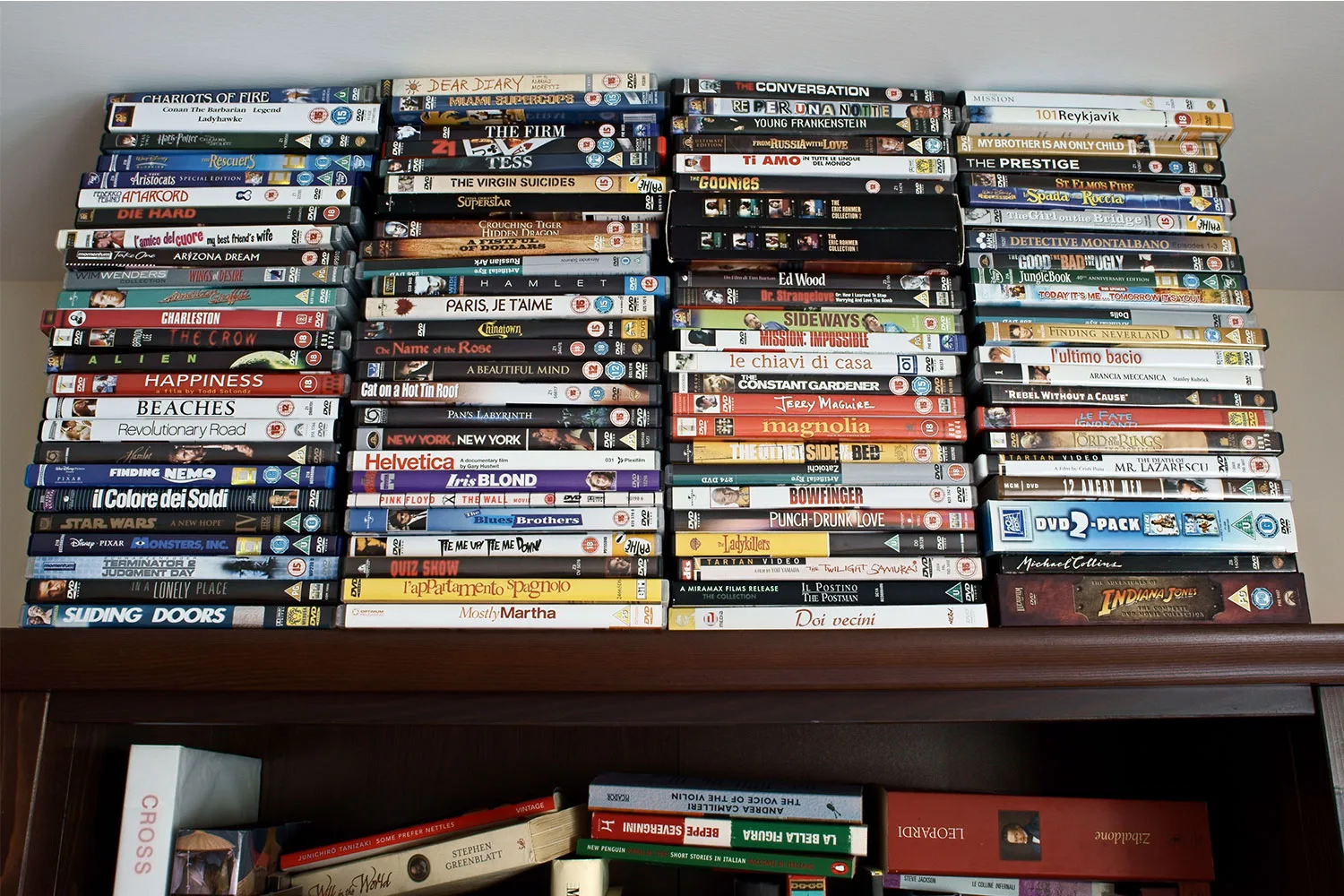 Stack of DVDs on shelf