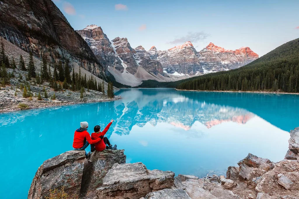 couple looking out towards mountain range