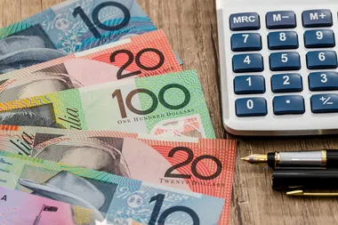 Australian moner, calculator and pens