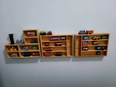 How this Kmart Mum turned some kitchen cutlery trays into this epic train storage wall rack