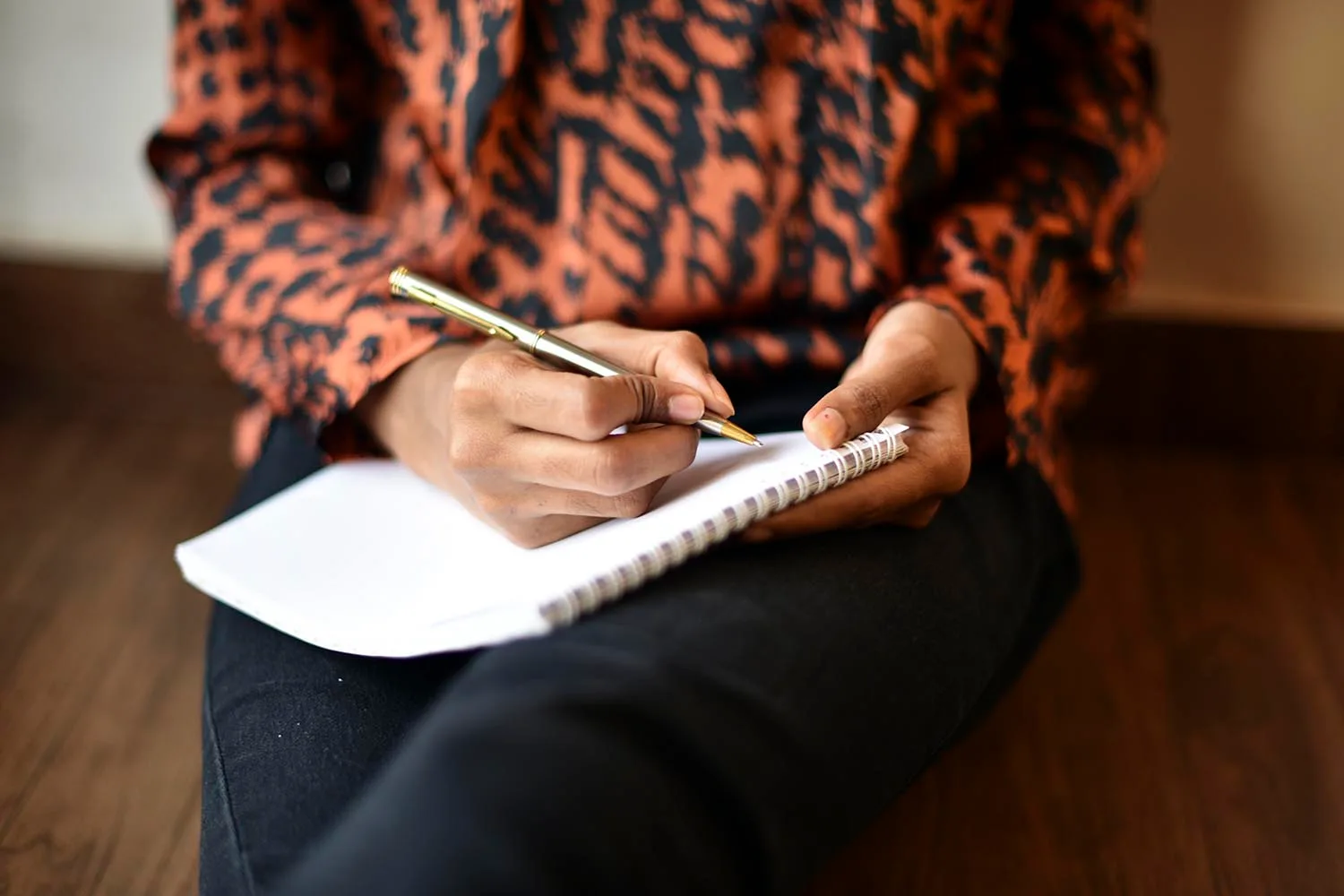 woman writing in journal