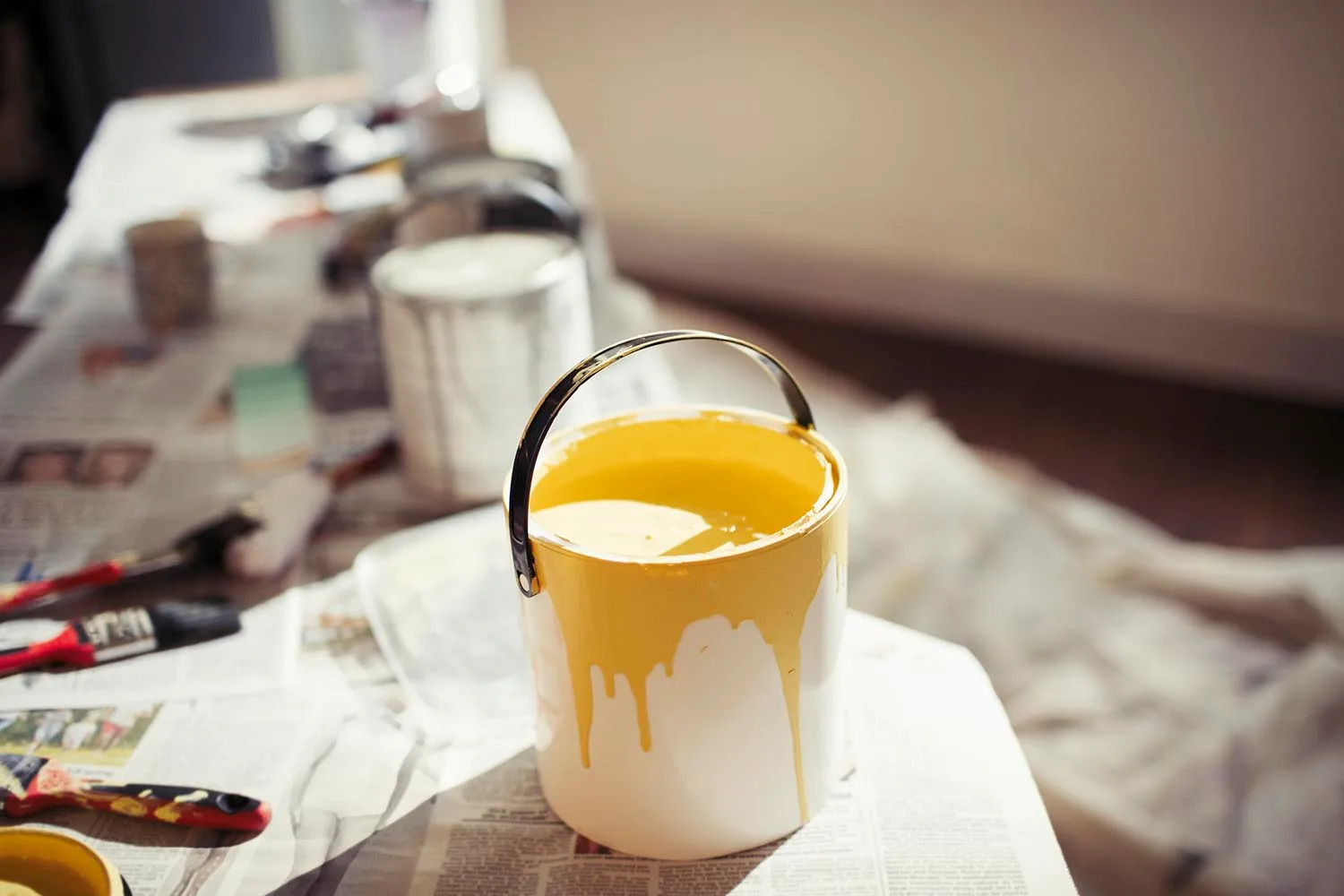 tin of yellow paint