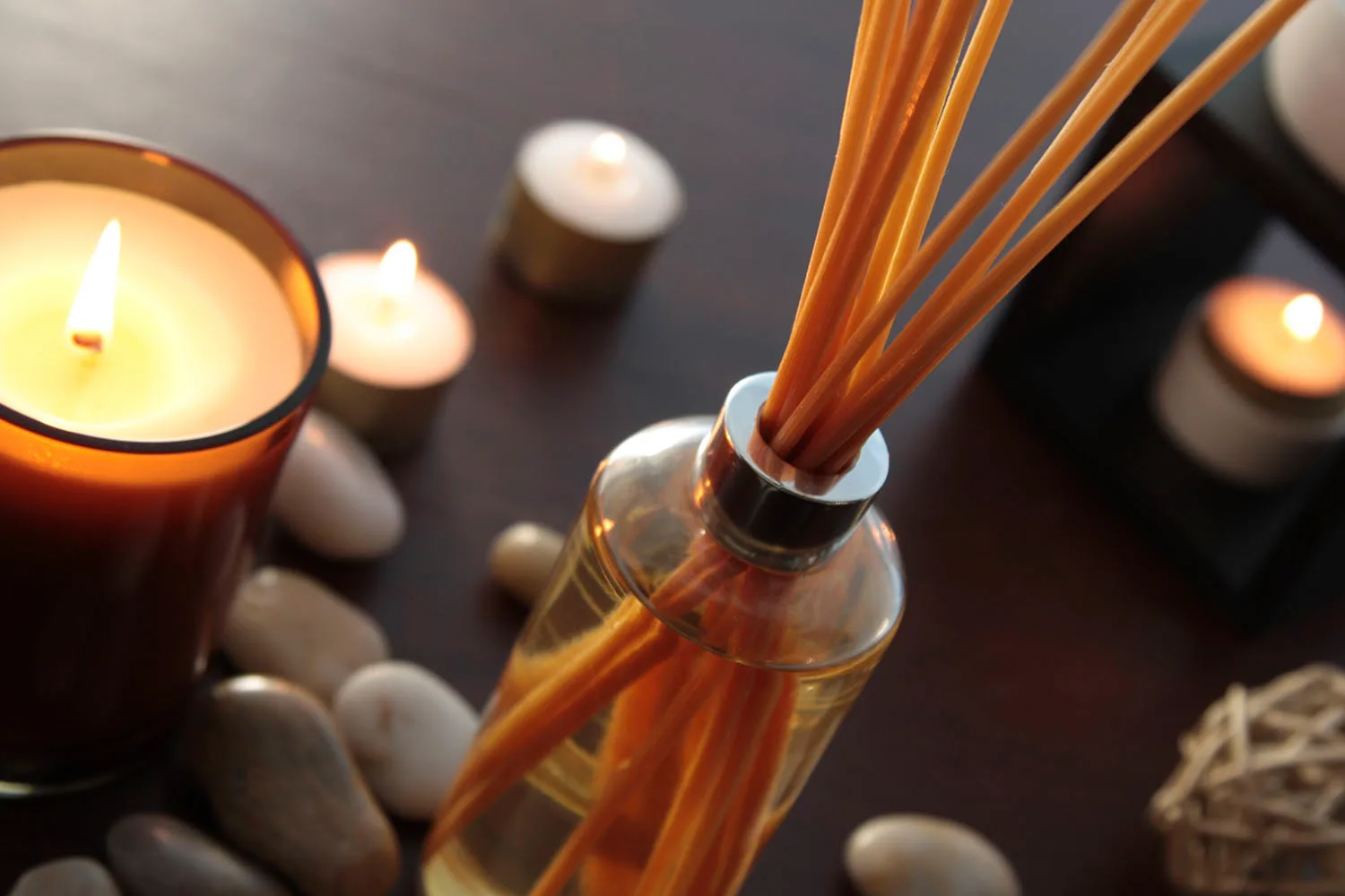 scented candle and aroma diffuser