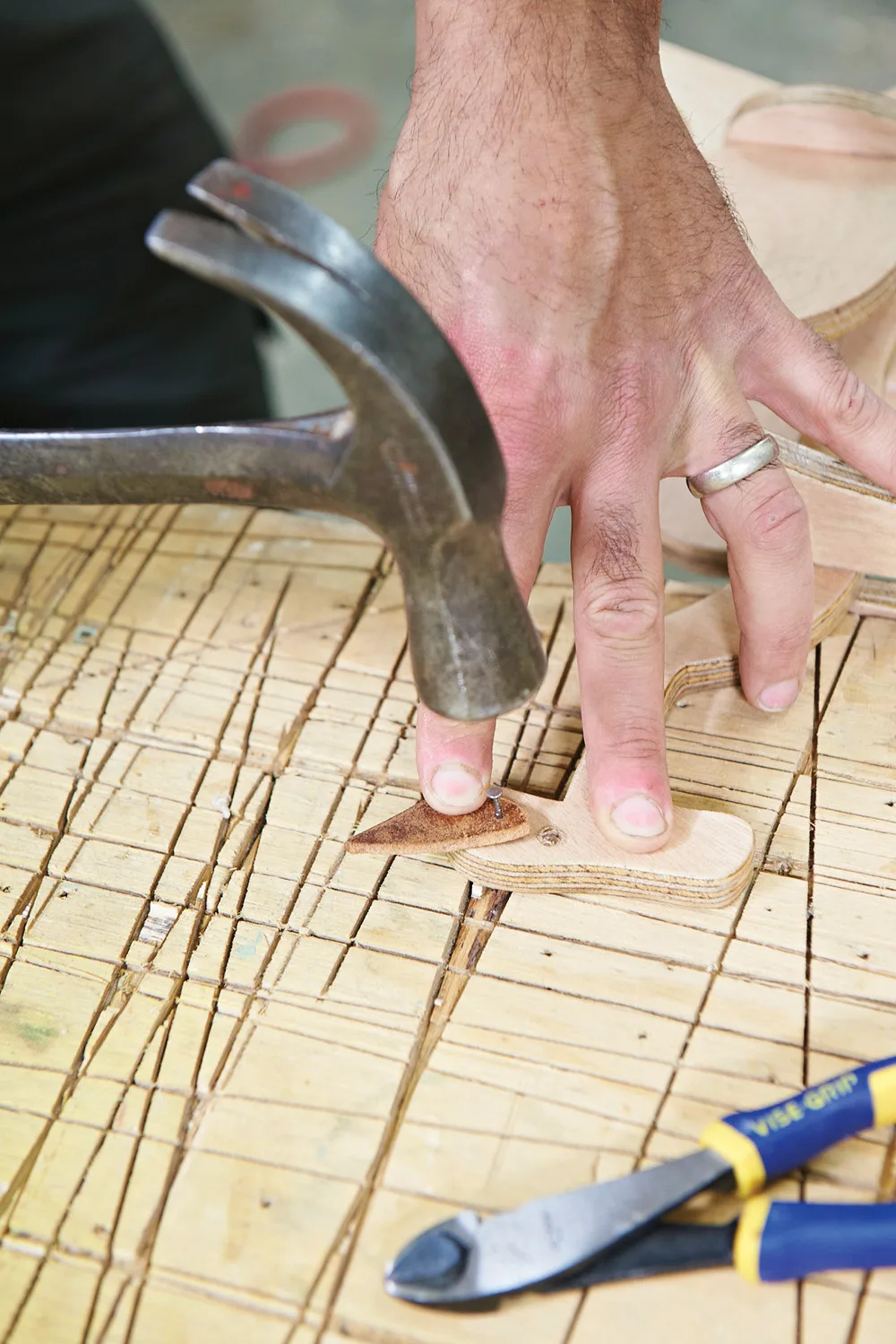 Nail leather ear to plywood kangaroo