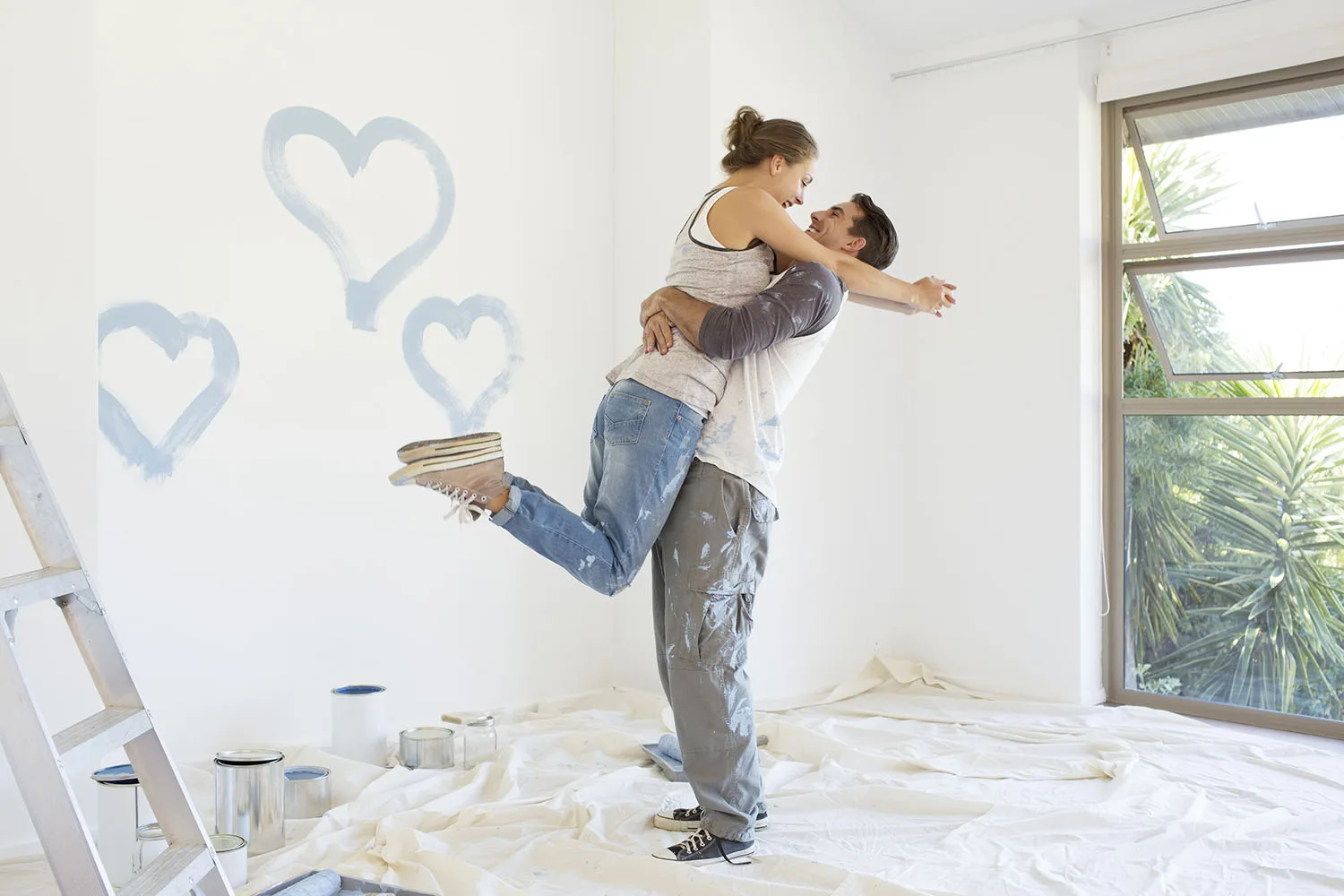 couple painting first home