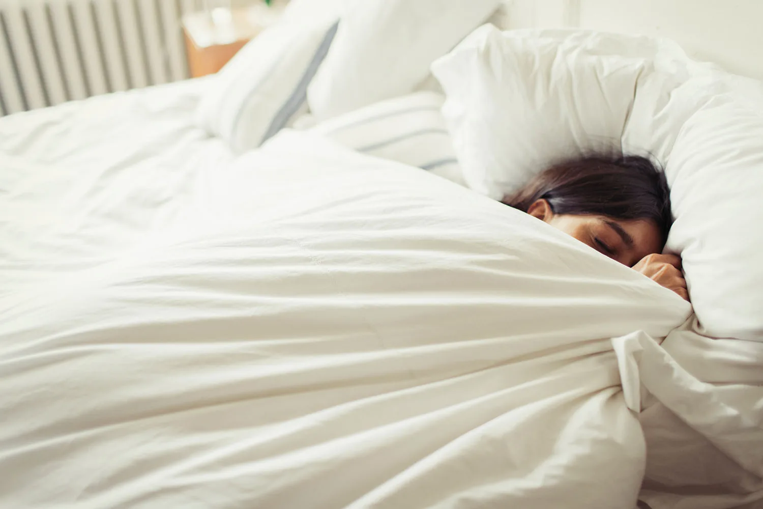 woman asleep in bed