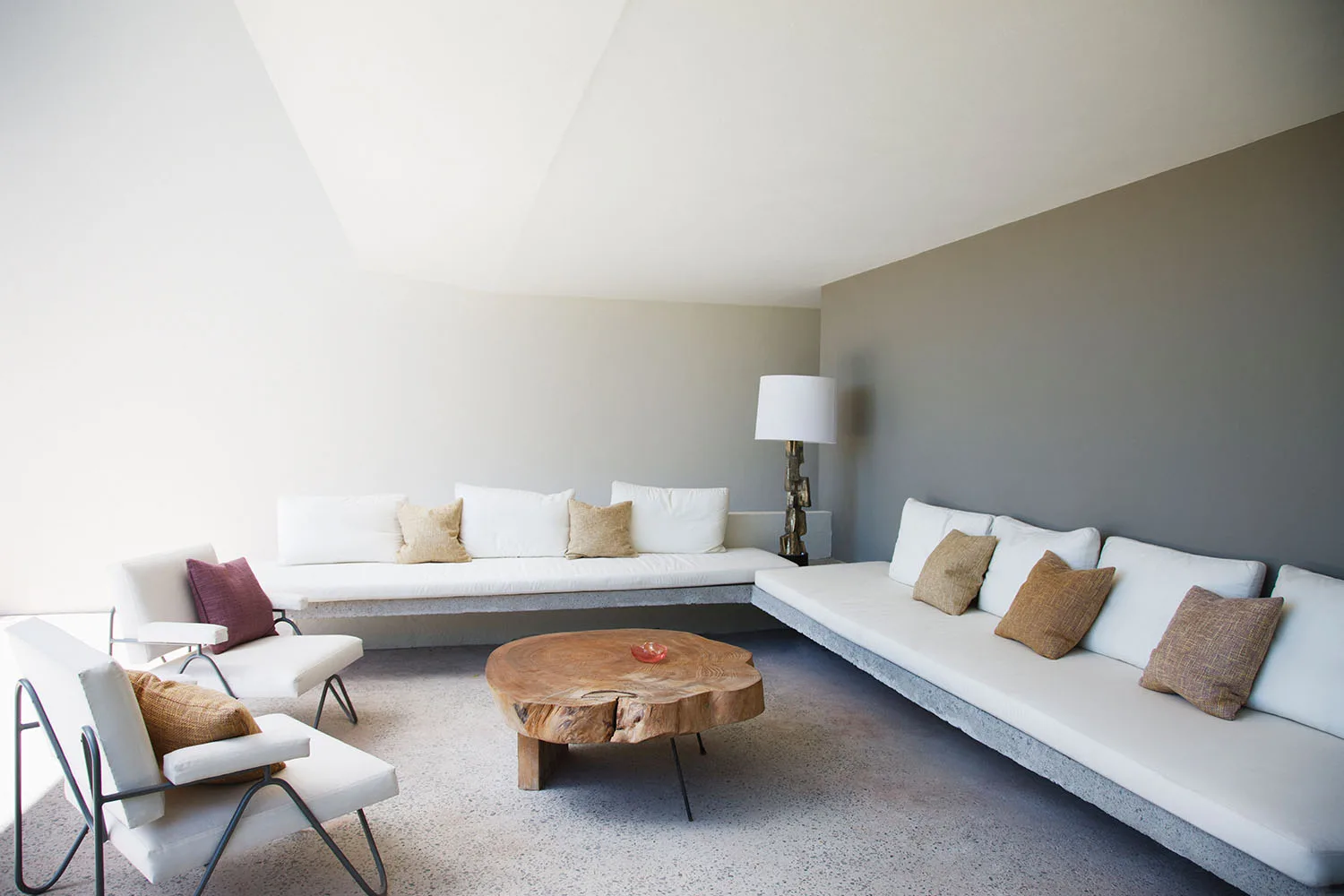 white room with timber coffee table