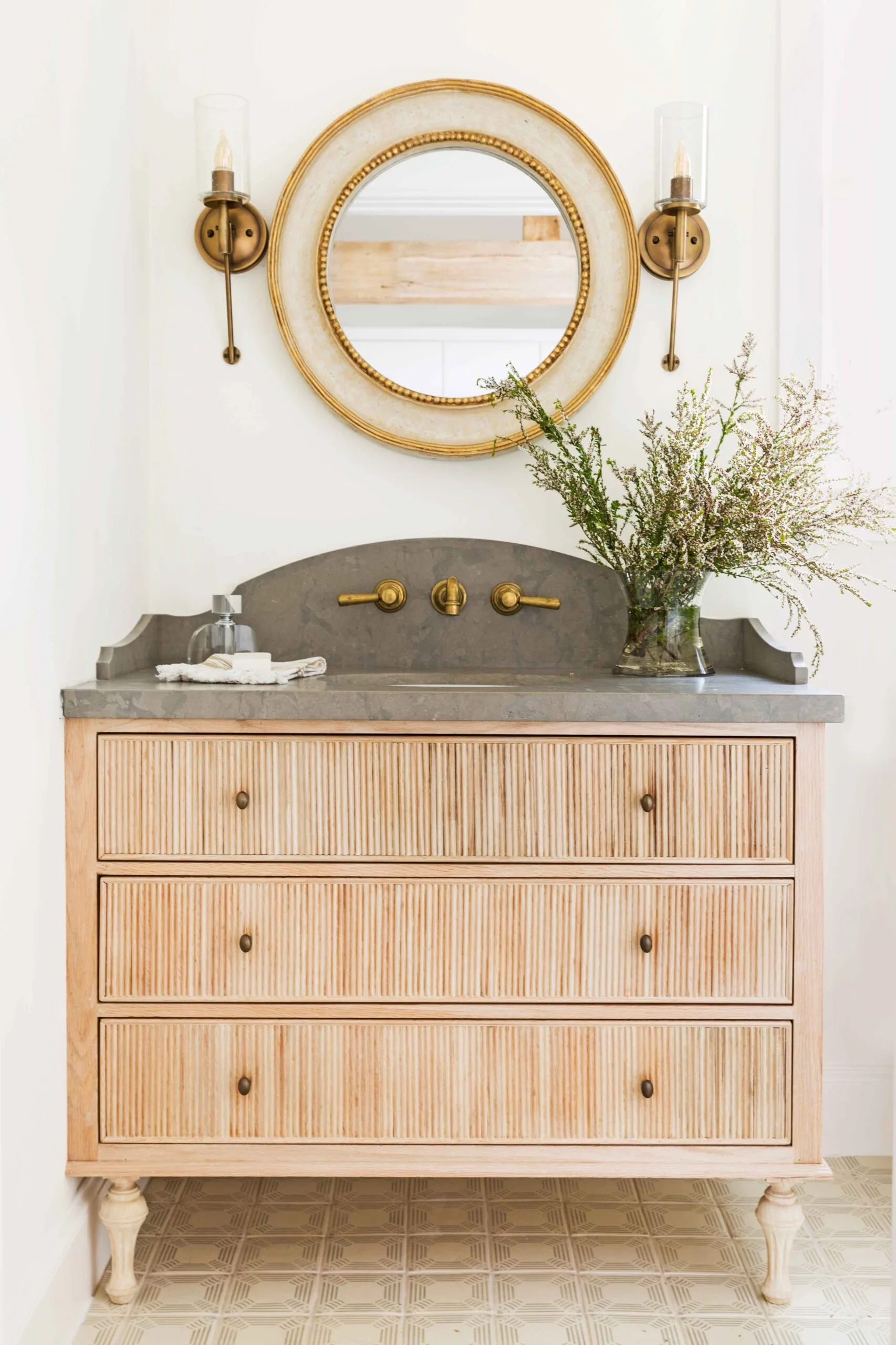 Bathroom vanity with brass taps