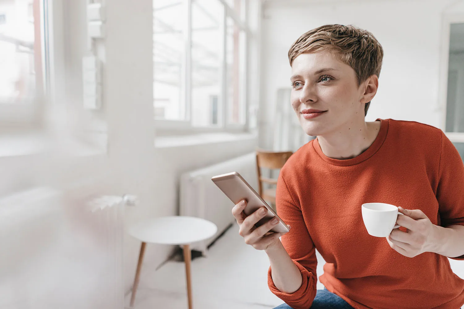 woman holding a phone