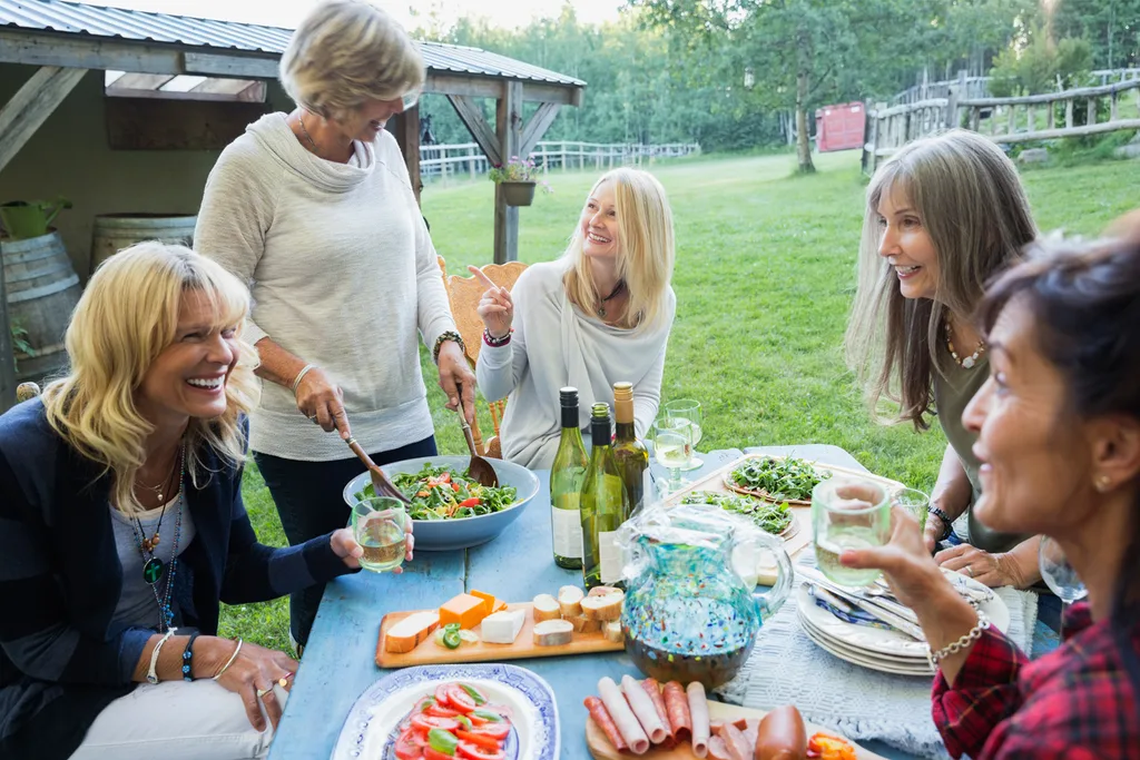 women eating lunch outdoors