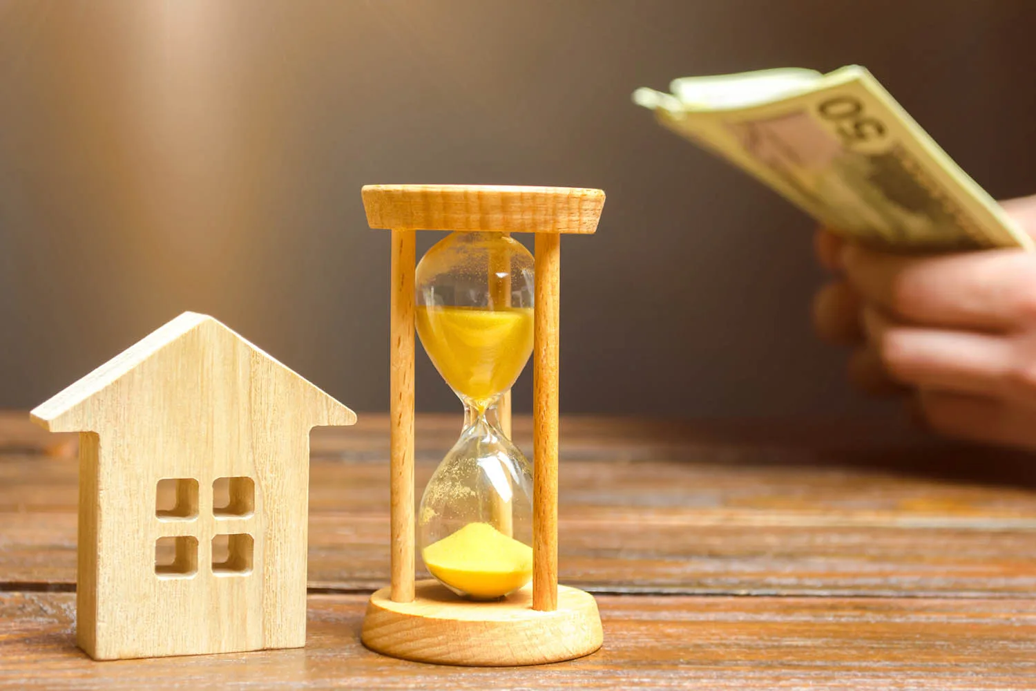 small house and hourglass