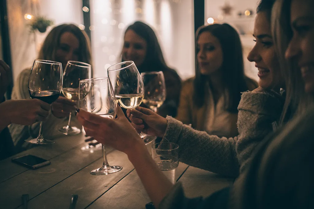 women drinking wine