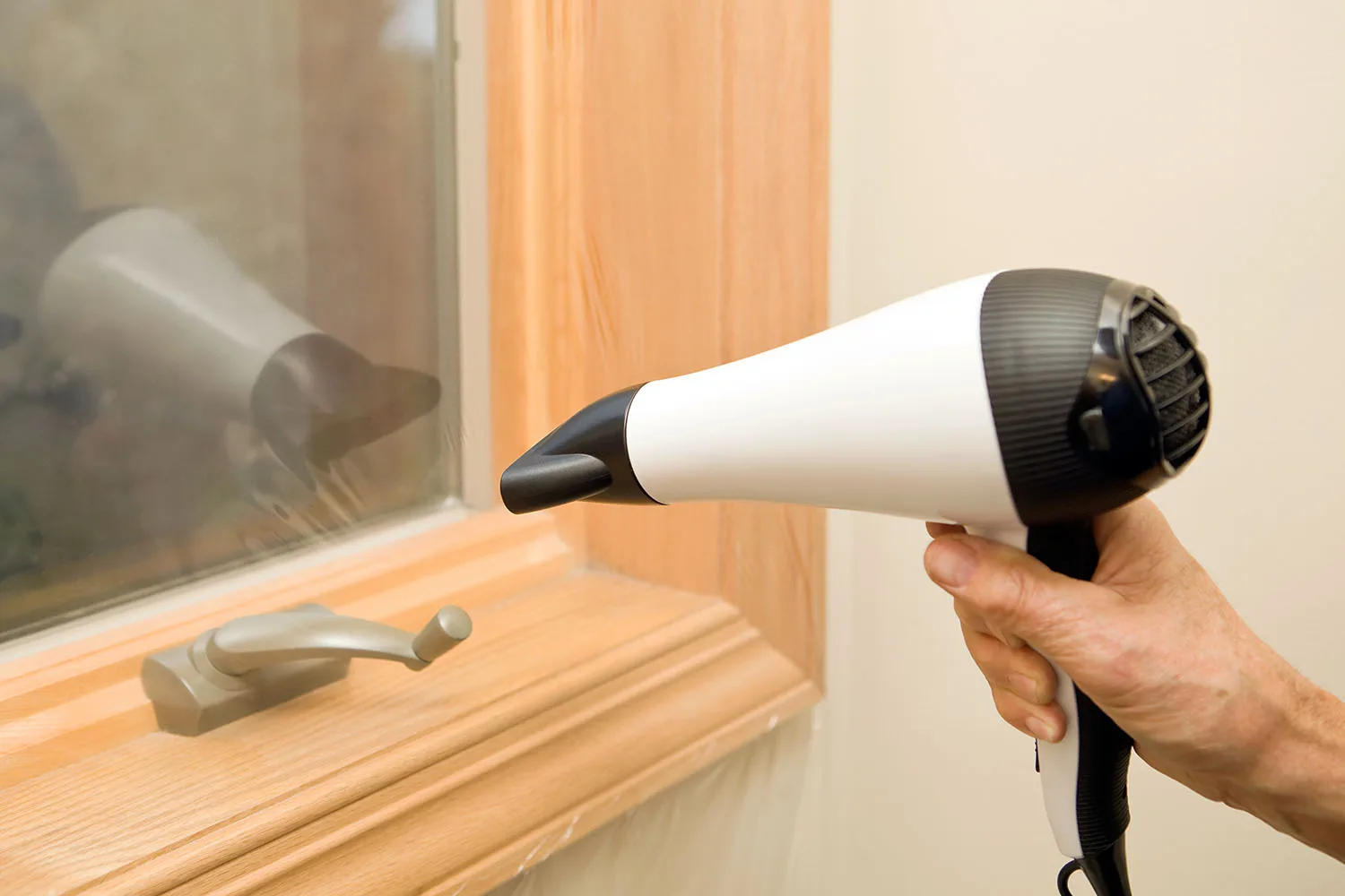 hairdryer drying window sealant