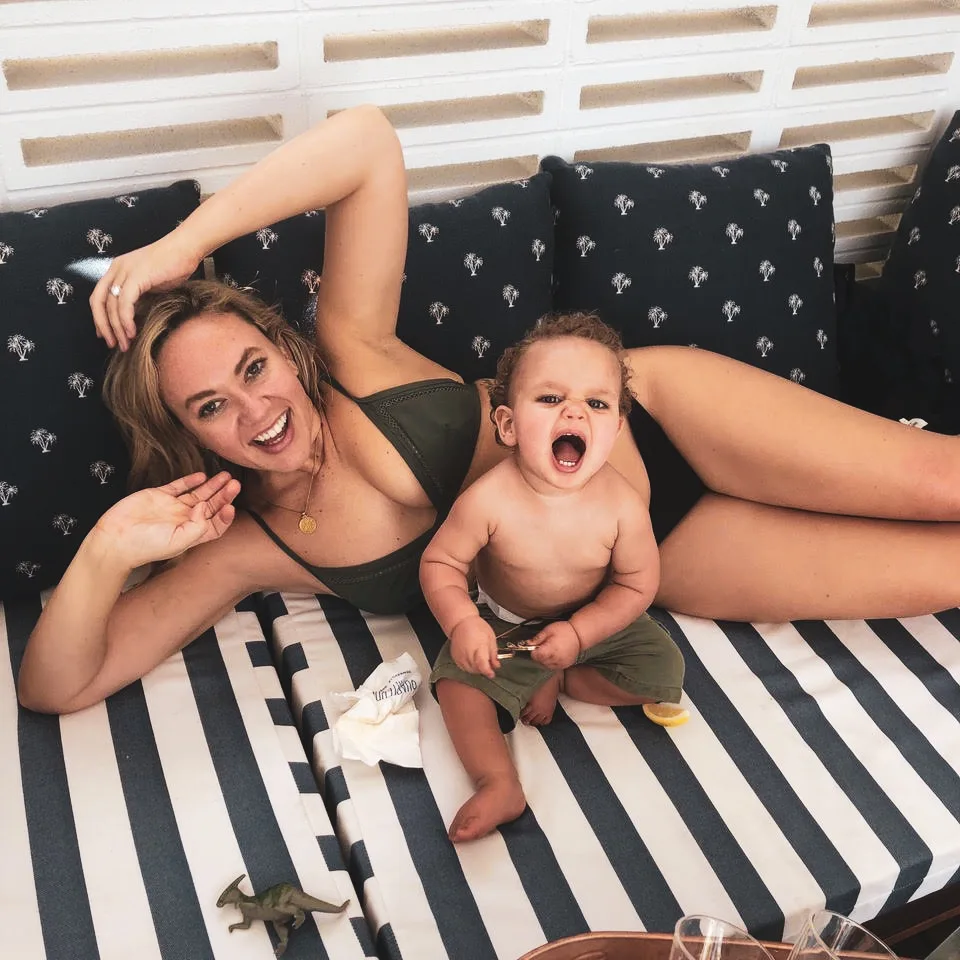 WHO's Editor Keshnee and son Xander enjoying their poolside cabana