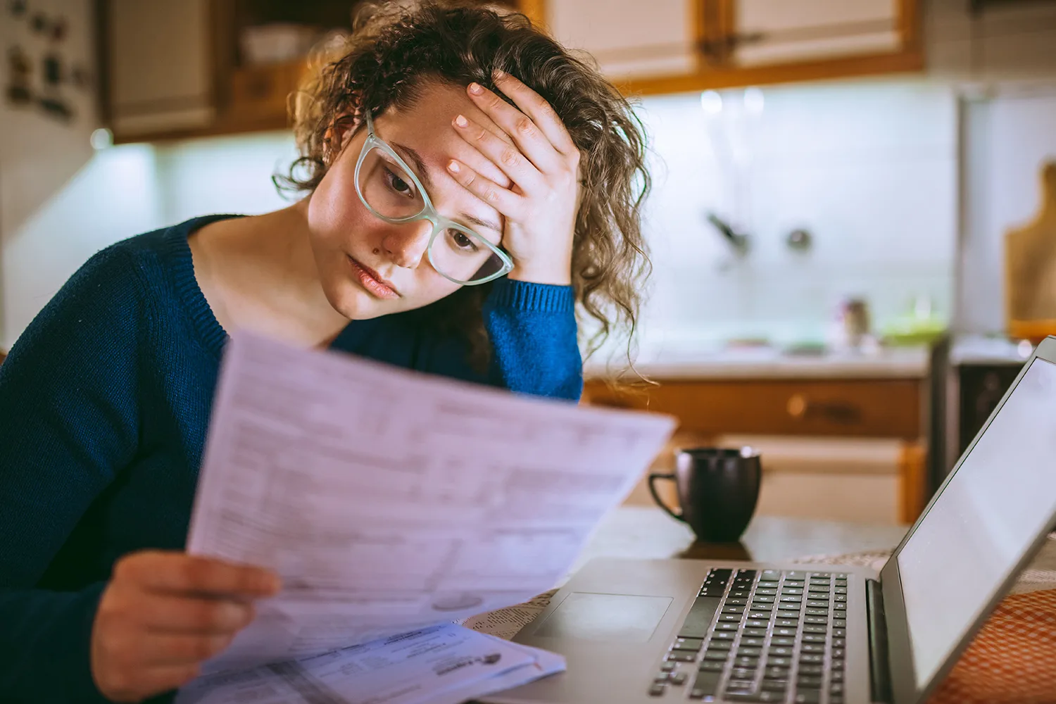 woman looking at paperwork