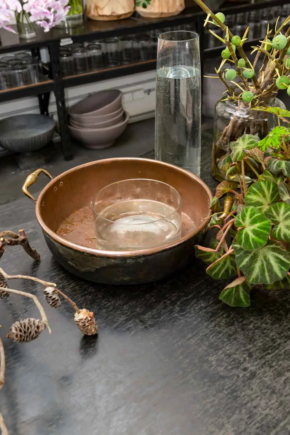 Bowl in a shallow container - step one of flower arrangement