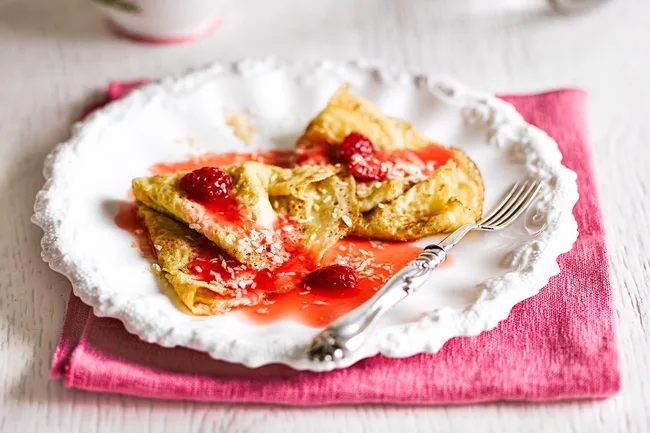 Healthier pancakes with raspberry drizzle
