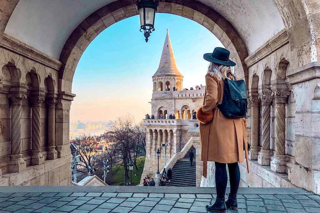 woman standing in front of fisherman's bastion, budapest