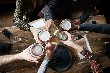 If you fake-smile a lot at work, you’re more likely to drink heavily