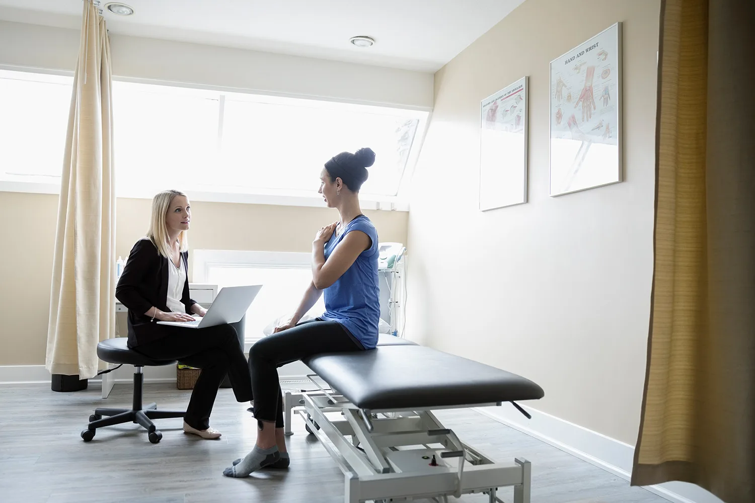 woman consulting doctor