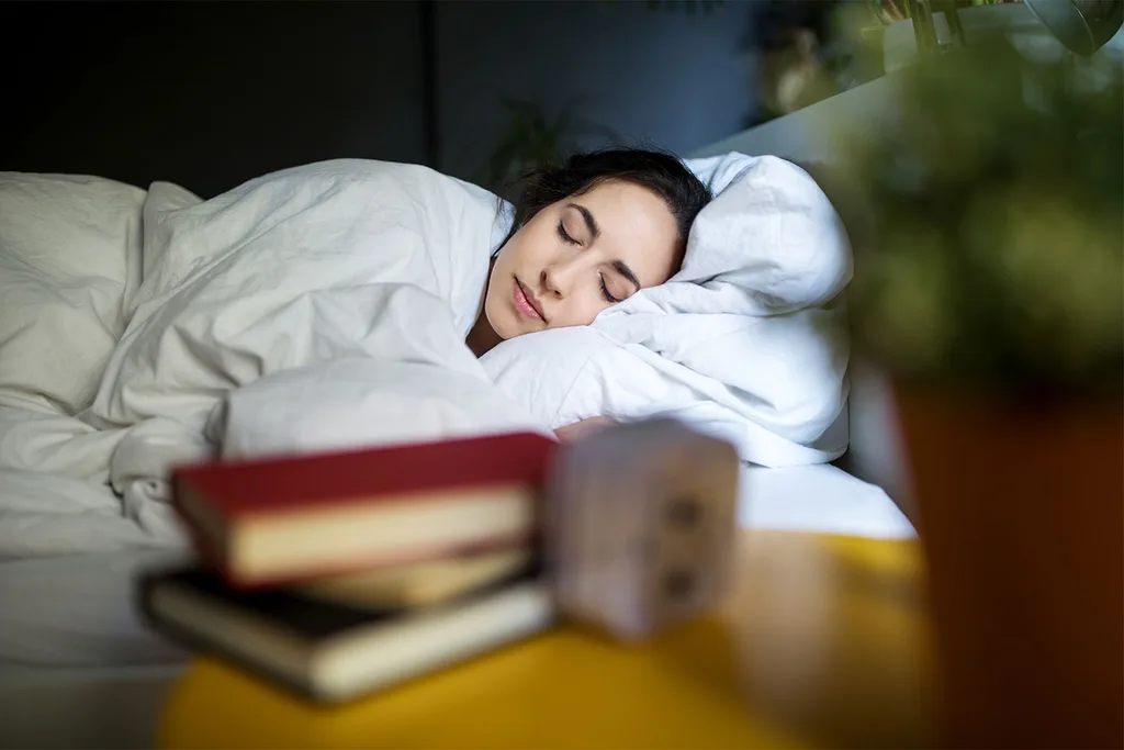 Woman sleeping in bed
