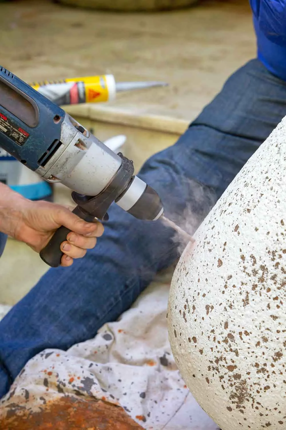 Drilling a hole in a pot