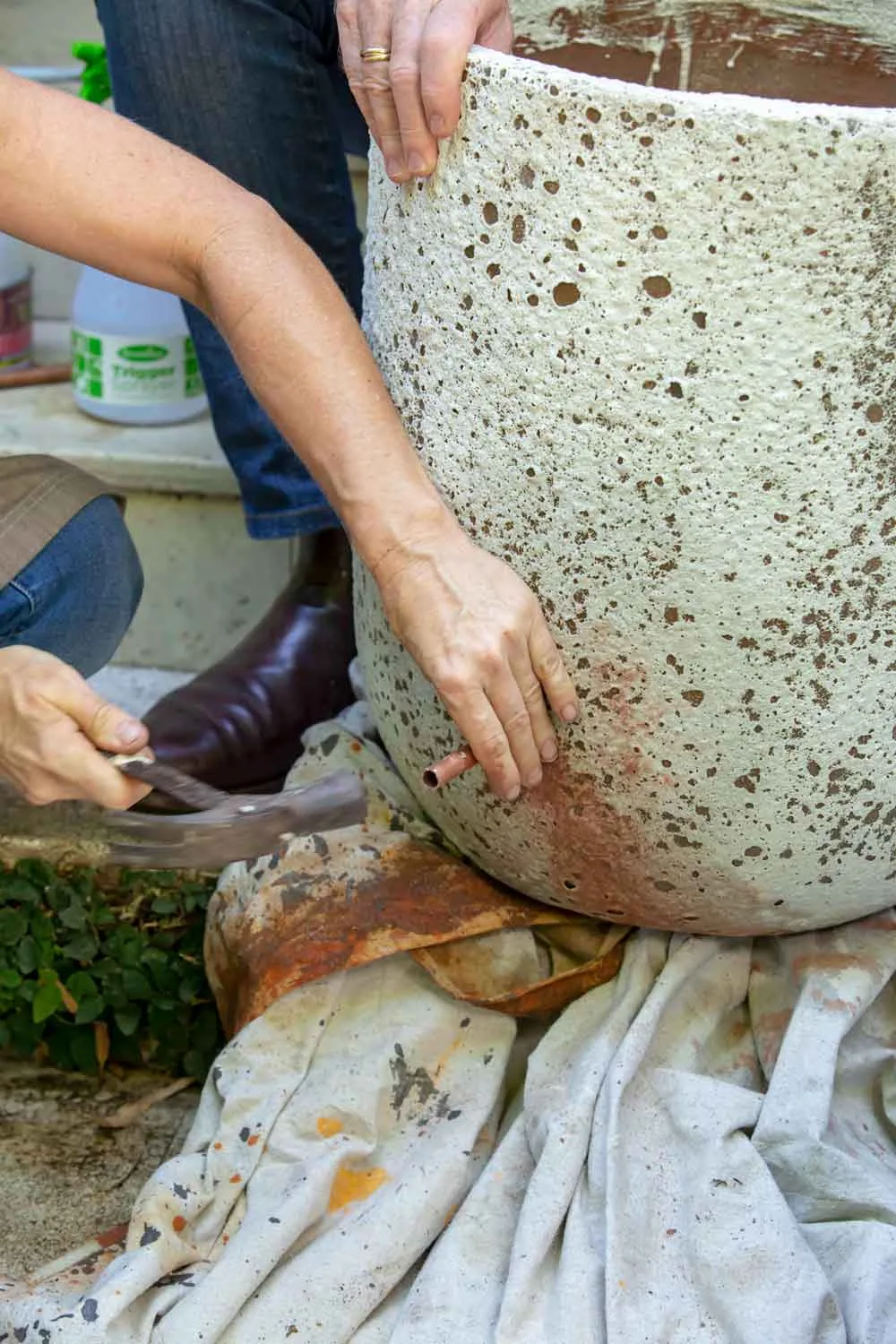 Hammer pipe into pot
