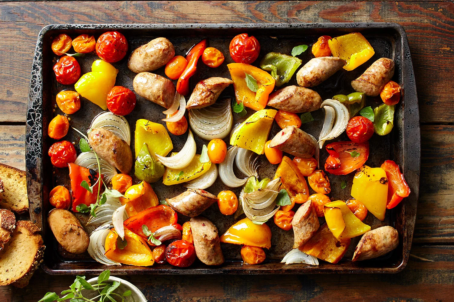 Roast chicken sausage and capsicum tray bake.