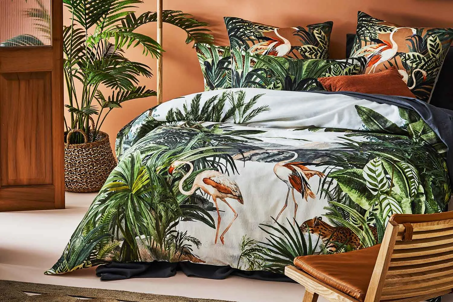 Bed with tropical print duvet