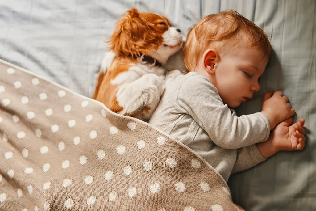 baby with puppy
