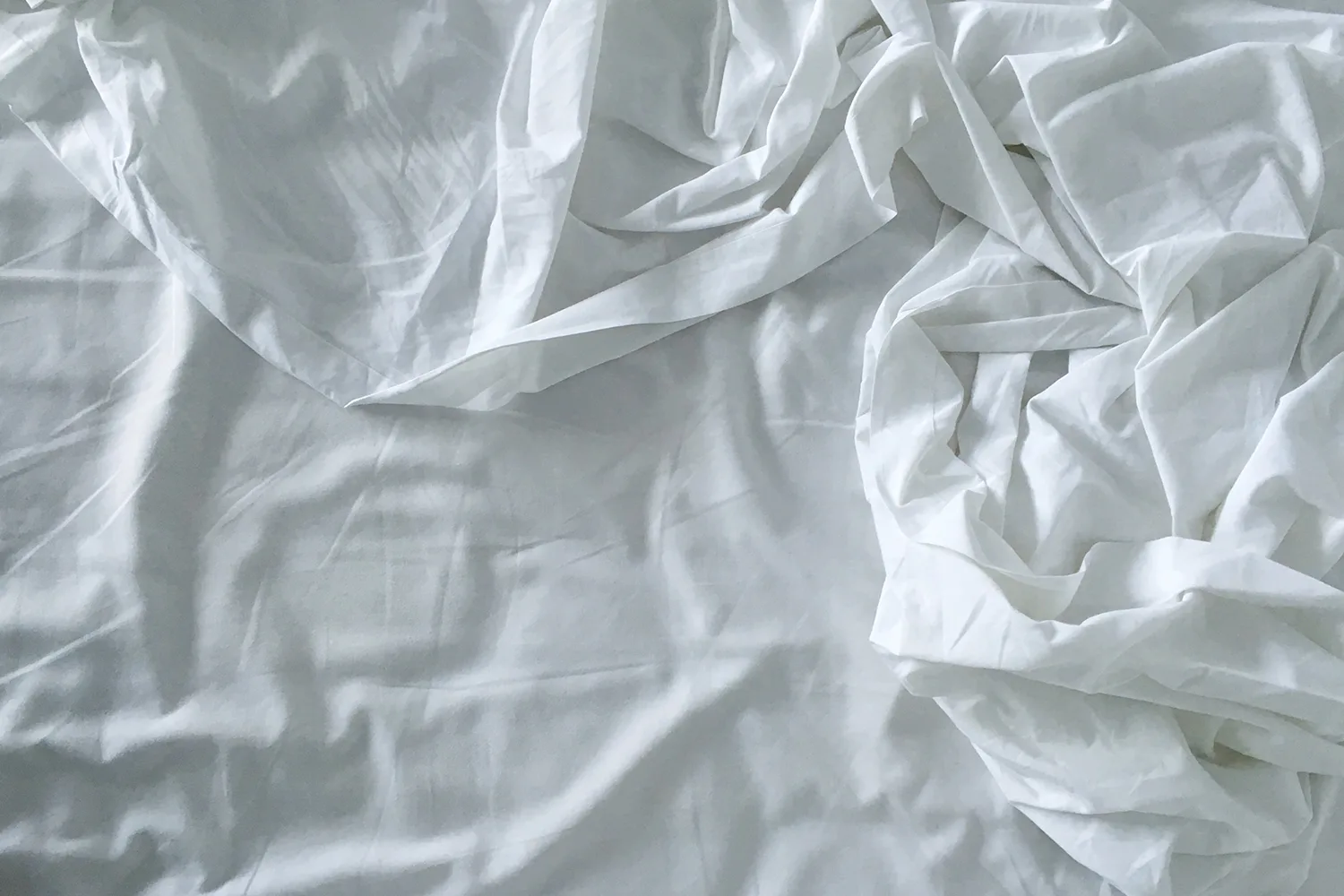 white bed sheets