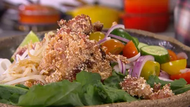 CRISPY HAM HOCK RICE NOODLE BOWL WITH SPICY SAUCE AND SHOOTS