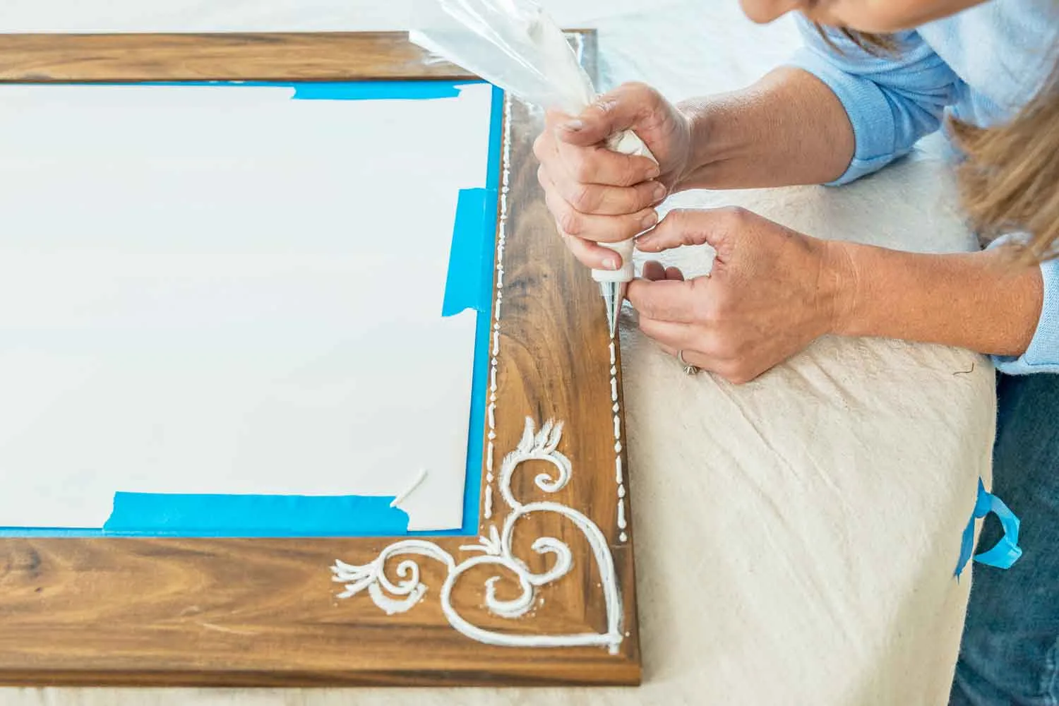 Pipe border on mirror frame