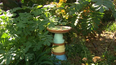 Freestyle bird bath and hanging bird feeder