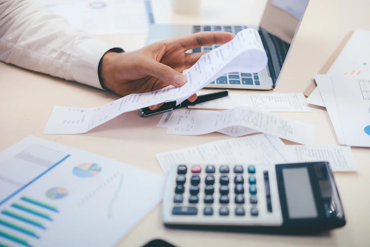 calculator and documents bills paper