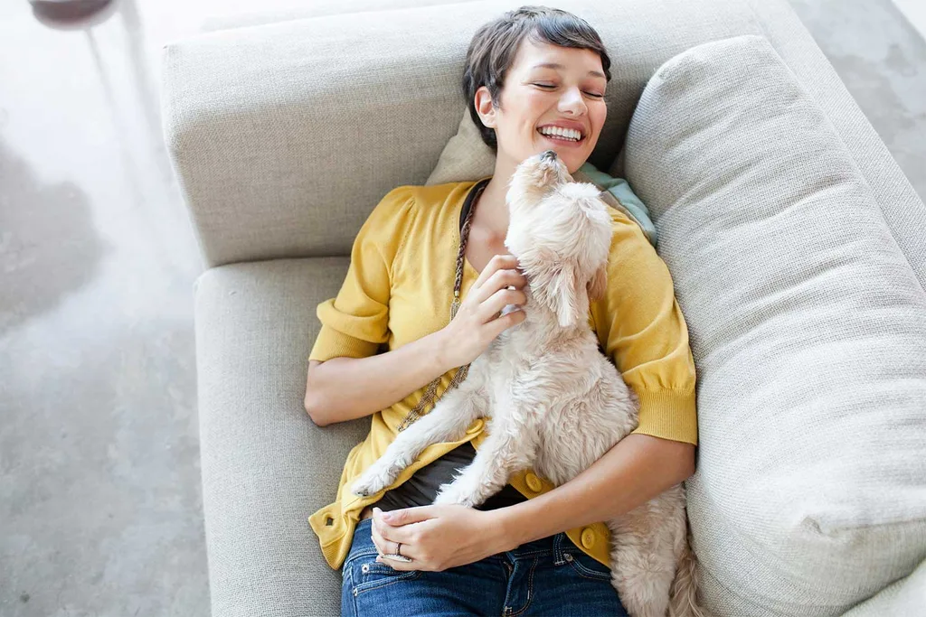Woman hugging dog