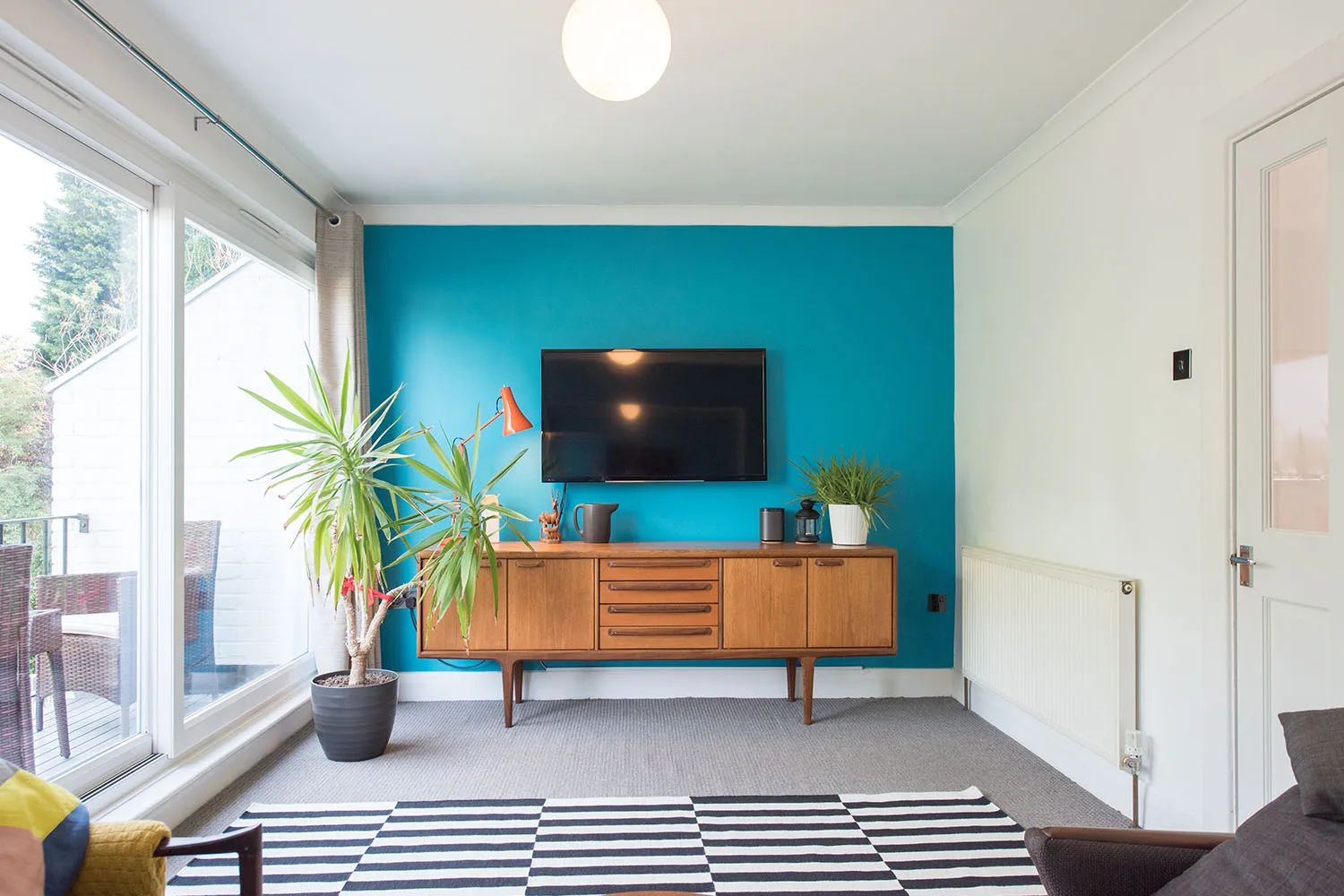 blue feature wall in living room