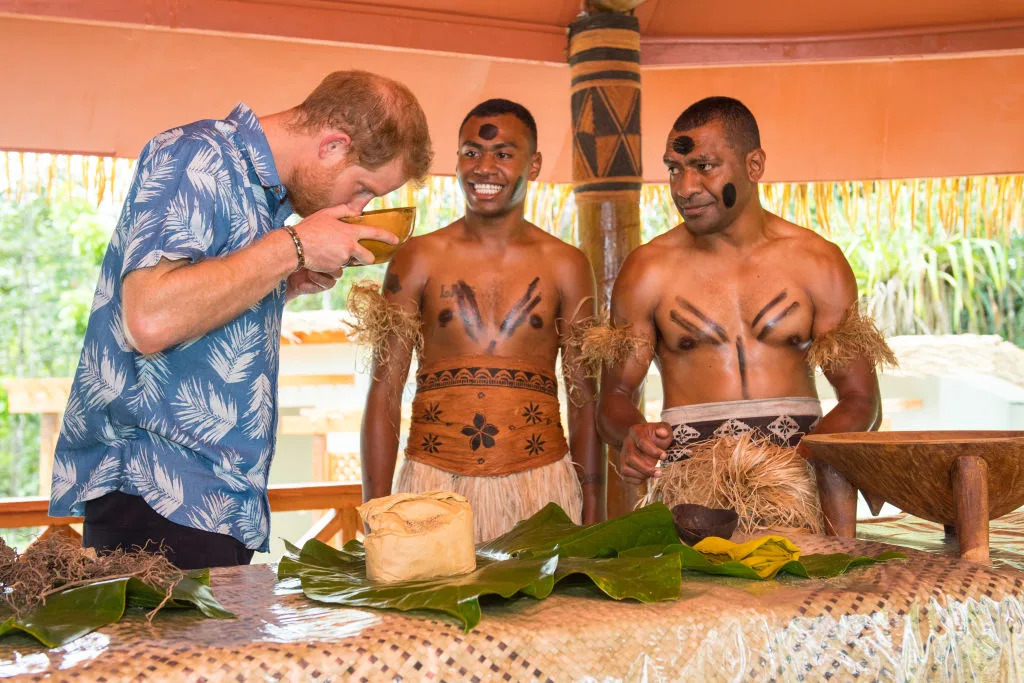 Prince Harry, Duke of Sussex, during a demonstration of kava making in Suva, Fiji, in 2018