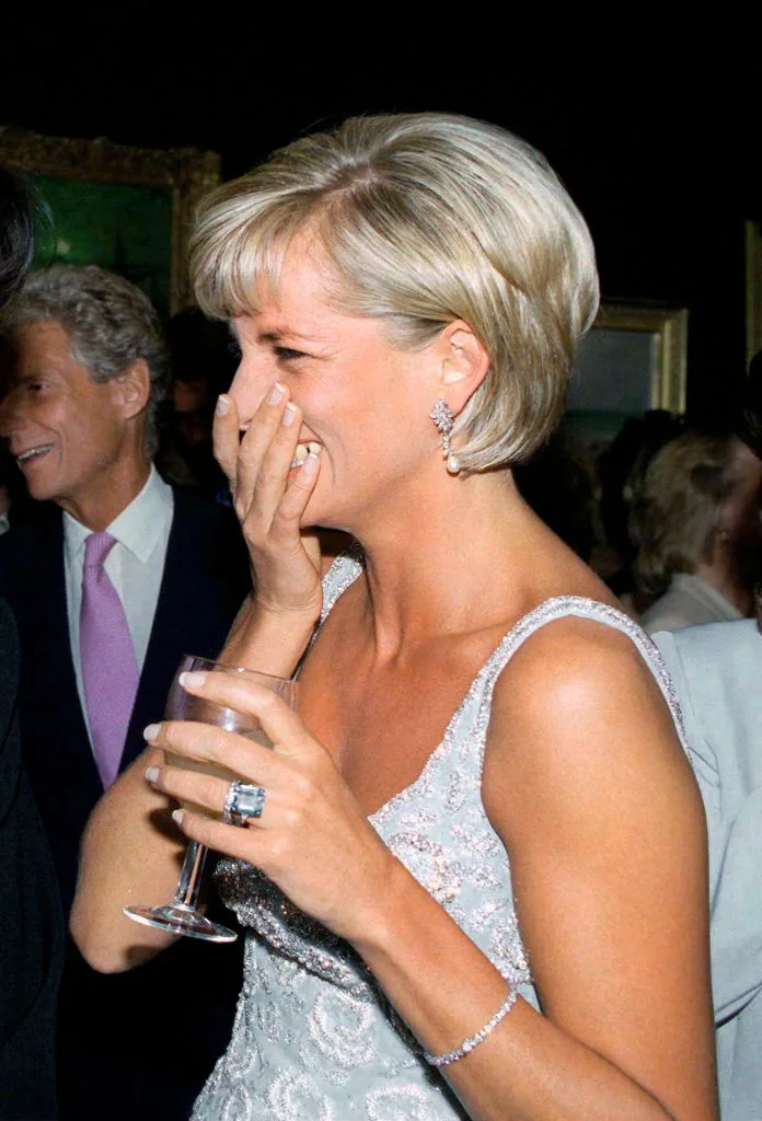 Diana wearing the Asprey ring, made from aquamarine