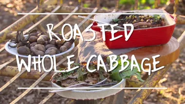 Roasted whole cabbage with blue cheese sauce and pecans
