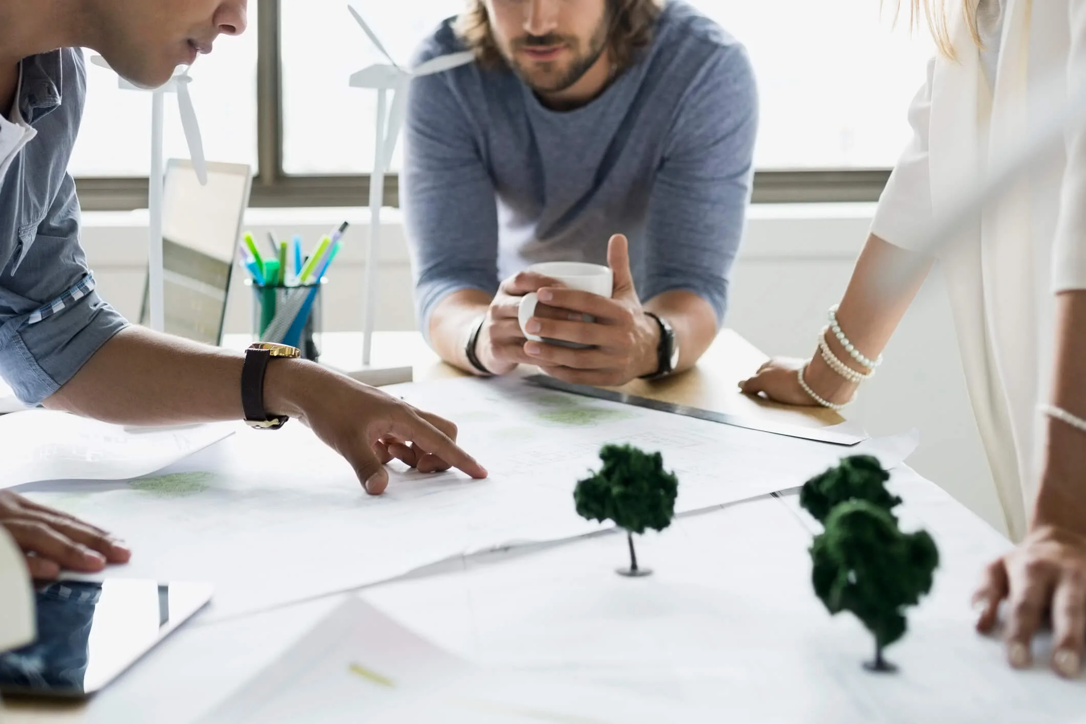 City planners looking at paper designs