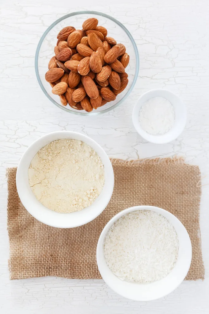 Little ceramic bowls of flour and almonds ready for baking