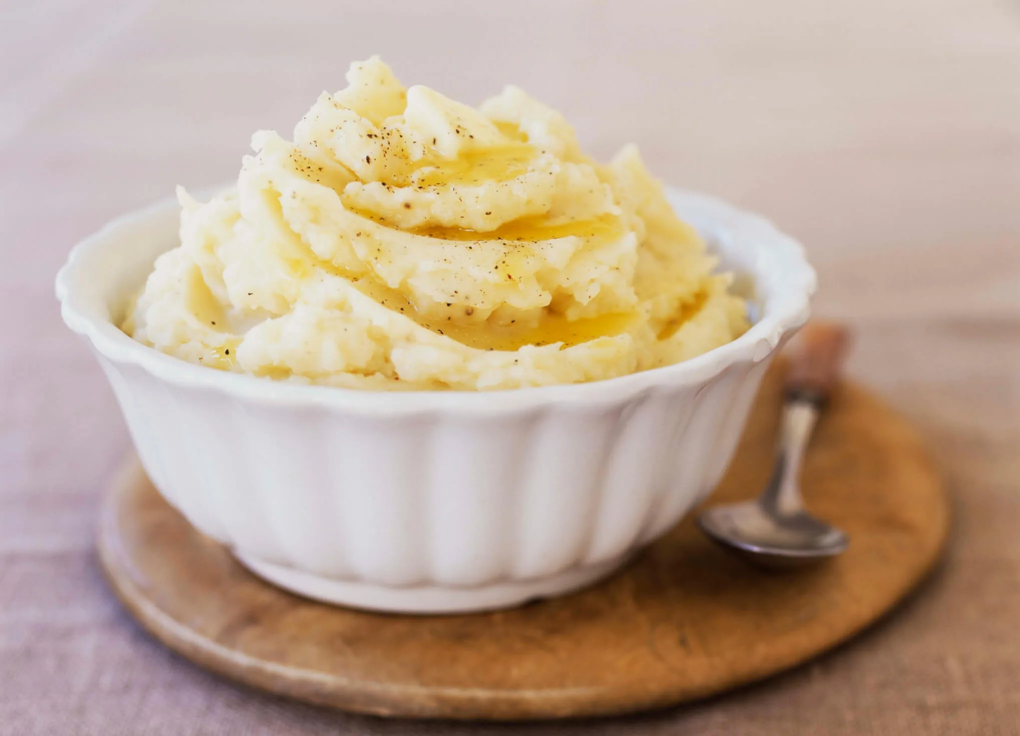 A small ceramic bowl of mashed potato