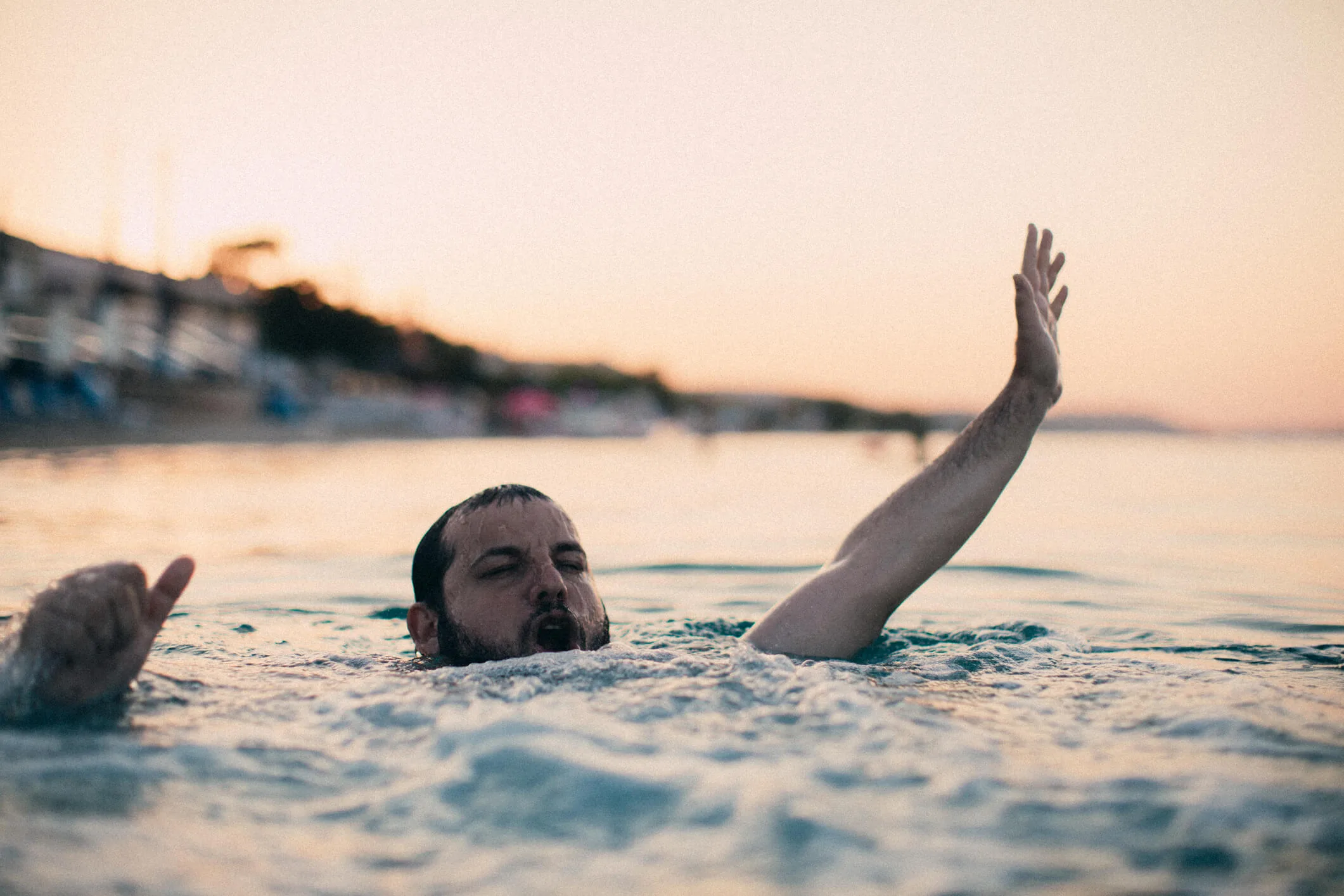 Man drowning at the beach