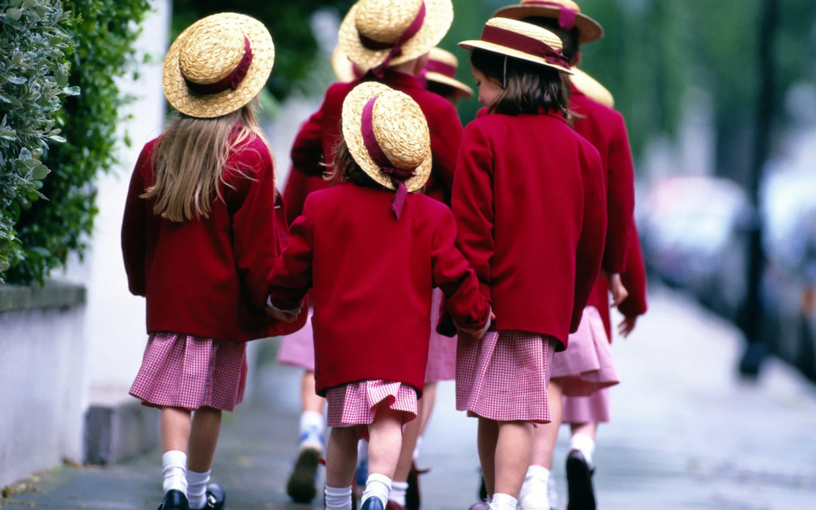 What is the legal age a child can walk to school alone?