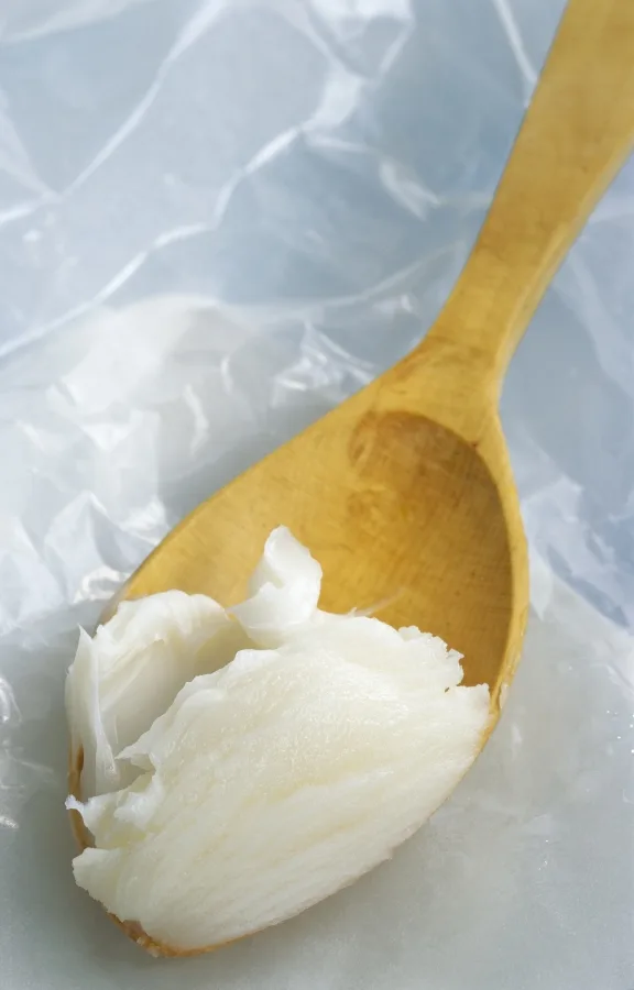 Shortening on a wooden spoon